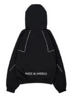 Back view of the black and white Marty Supreme jacket.