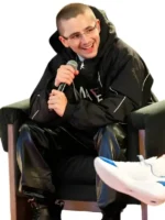 Styling close-up of the black and white Marty Supreme jacket for street fashion.