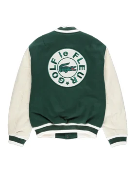 Tyler the Creator green varsity jacket and fur hat giving a speech on stage. Golf le Fleur style.