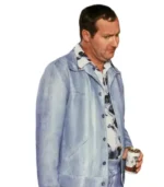 Randy Quaid as Cousin Eddie Johnson side profile view in powder blue leisure jacket holding beer can from National Lampoon's Christmas Vacation