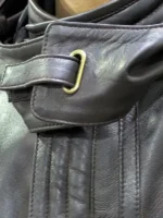 Model wearing the Diego Luna Andor Brown Leather Coat in a cinematic outdoor setting.