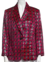 A front view of Lily Collins in a vibrant Printed Blazer with a structured collar and bold patterns.