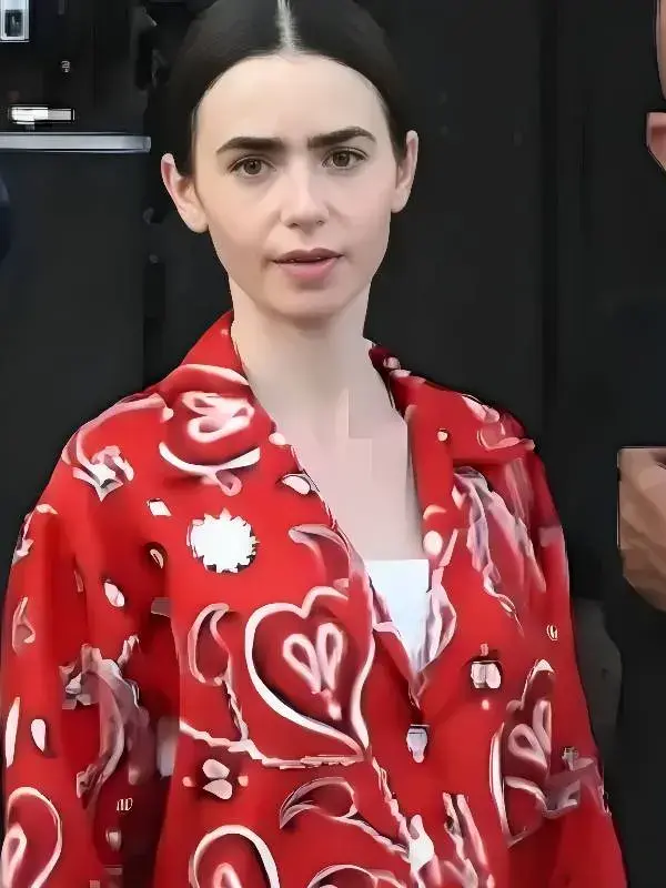 Emily In Paris S05 Lily Collins Red Paisley Shirt Lily Collins wearing a vibrant Red Paisley Shirt with intricate teardrop patterns in Emily in Paris S05.