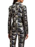 The back view of the Minnie Driver black and blue jacquard blazer from Emily in Paris S05 showcasing the tailored fit.