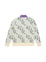The back view of the purple floral cardigan worn by Samuel Arnold as Julien in Emily in Paris Season 5.