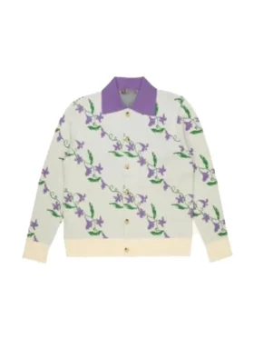 A front view of the Samuel Arnold purple floral cardigan featuring a classic button closure and ribbed cuffs.
