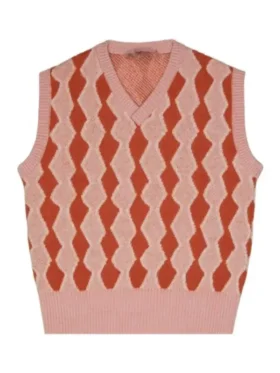 A front view of Samuel Arnold in a pink V-neck Sweater Vest with a ribbed trim and tailored fit.
