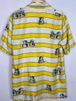 A back view of the Yellow Striped Shirt showing the vertical citrus pattern and tailored back yoke.