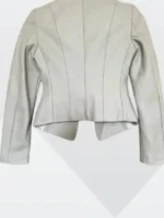 The back view of the Emily In Paris S05 Thalia Besson Asymmetric Jacket showing the clean tailored fit.