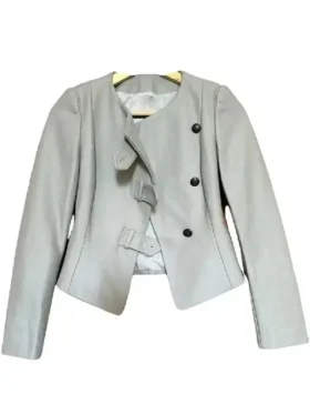 A sharp front view of the Thalia Besson asymmetric jacket featuring a modern lapel and offset closure.