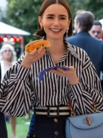 Lily Collins in the stylish striped puff sleeve shirt from Emily in Paris Season 5.