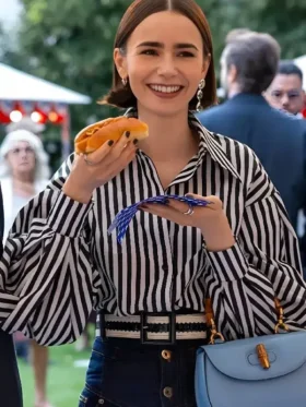 Lily Collins in the stylish striped puff sleeve shirt from Emily in Paris Season 5.