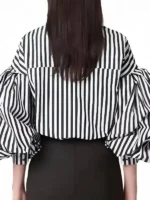 Back view of the striped puff sleeve shirt worn by Lily Collins on the show.