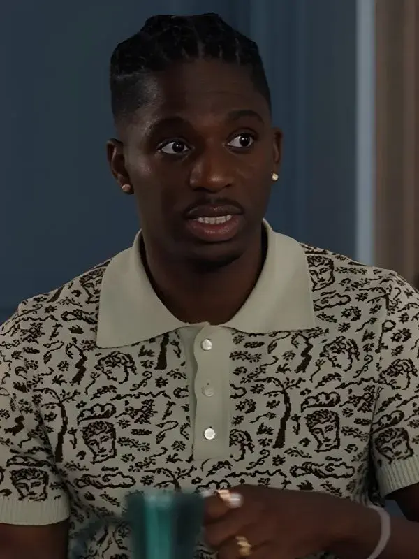 Emily in Paris S05 Samuel Arnold Polo Shirt Samuel Arnold as Julien in Emily in Paris Season 5 wearing a multicolor jacquard knit polo shirt.