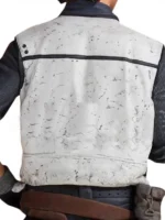 A man wearing a brown pilot jacket and matching vest inspired by Han Solo’s film look.