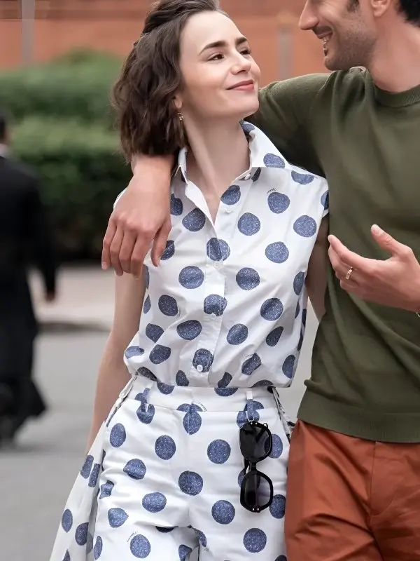 Lily-Collins-TV-Series-Emily-In-Paris-S05-Emily-Cooper-Polka-Dots-Top Lily Collins showcasing a trendy polka dots top from the hit series.