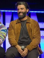 A man wearing a premium brown suede jacket with a classic collar and front zip closure.