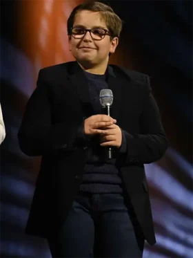 Robert Timothy Smith wearing a sleek black blazer from the Star Wars Skeleton Crew series.