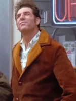 Cosmo Kramer wearing a classic brown jacket from the TV show Seinfeld.