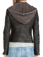 Emmy Rossum wearing a stylish black leather jacket from her famous TV role.