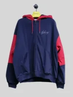 Front view of the Martine Rose Big Business Jacket in navy blue fleece with a zipper.