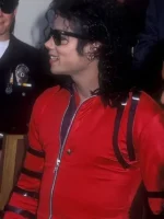 Close-up of the durable silver zipper closure on the red MJ 1987 jacket.