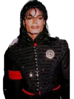 Close-up of the bold metallic buttons on the front of the Michael Jackson black Hussar jacket.