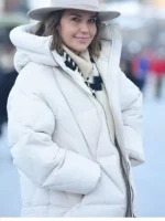 Arielle Kebbel wearing a black puffer jacket at the 2026 Sundance Film Festival with TV Jackets.