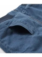 A full-length shot of the Breeze x Dragon Ball denim jacket in a 2026 anime streetwear style.