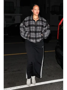Celebrity inspired checked teddy fleece jacket worn by Rihanna, designed for cozy street style with a modern zip-up finish.
