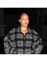 Celebrity-inspired checked teddy fleece jacket worn by Rihanna, featuring grey plaid pattern and zip-up front styling.