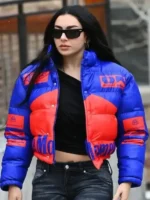Charli XCX in a black cropped hooded jacket at Sundance 2026, styled by TV Jackets.