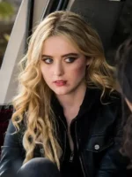 Claire Novak black leather bomber jacket showcasing a minimalist urban aesthetic and a high-end grain with durable reinforced stitching.