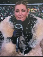 Erin Andrews black and smoke gradient mix fur coat detail.