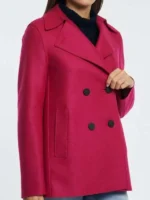 Kristen Vaganos Pink Peacoat showing the side-profile and sleeve fit.