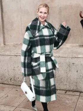Kelly Rutherford wearing a long beige wrap coat at Paris Fashion Week 2026 from TV Jackets.