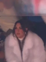 Kennedy Stidham white vegan fur coat inspired winter style with soft plush texture and clean mid-length silhouette.