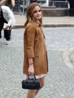 Emma Watson Summer Spring 2026 brown suede leather coat in a full-length look.
