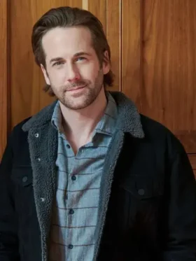 A close-up of the metal zipper closure on the Niall Matter black jacket from TV Jackets.