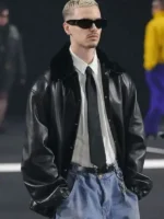 Front view of the PFW 2026 Romeo Beckham black leather jacket with silver zipper at TV Jackets.