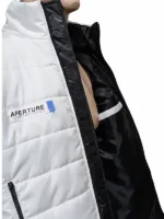 Detailed view of a white fabric puffer jacket with a full zipper closure, soft lining, and zippered arm pockets.