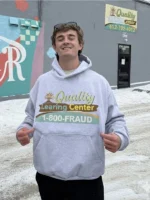 The viral grey "Learing" Center hoodie inspired by the Nick Shirley Minneapolis news video.