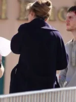 Rebecca Hall character Agent Jordan Bennett wearing a blue wool coat in The Beauty.