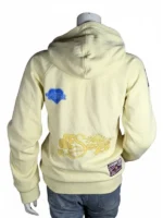 Detailed view of the butter yellow Salish Matter hoodie with rib-knitted cuffs and high-quality transfer print graphics.