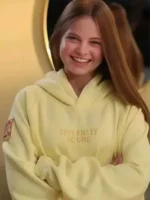 Close-up front view of the yellow Salish Matter Sincerely Yours hoodie showing the text design.