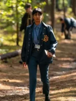 Sunita Mani wearing a bright blue jacket from the series His and Hers by TV Jackets.