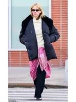 A full view of the viral Jennifer Lawrence 2026 NYC oversized black quilted jacket.