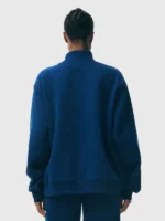 Parke blue turtleneck sweatshirt fleece showing back silhouette and fit.