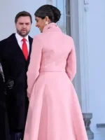 Back view of Usha Vance pink inauguration inspired long coat with belt and smooth winter drape.
