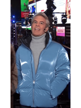 Half-zipped front view of the Andy Cohen blue puffer jacket showing the high collar.